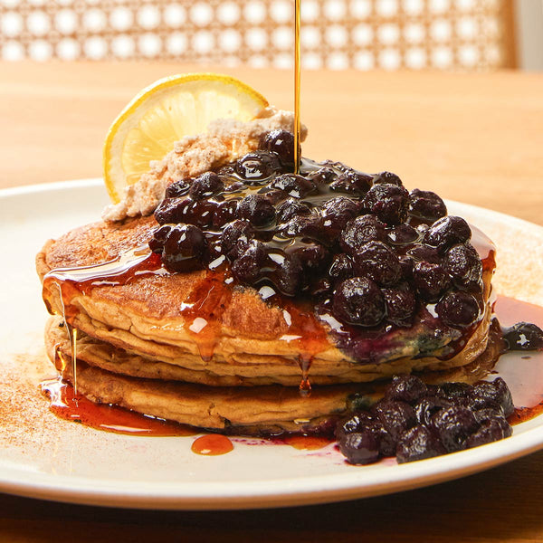 vegan blueberry protein pancakes with maple syrup at Cafe Gratitude